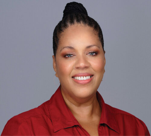 Headshot photo of Jean Campbell smiling