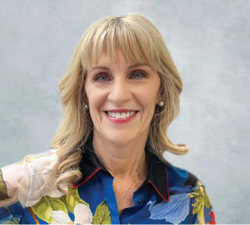 Headshot photo of Gina Grossman smiling