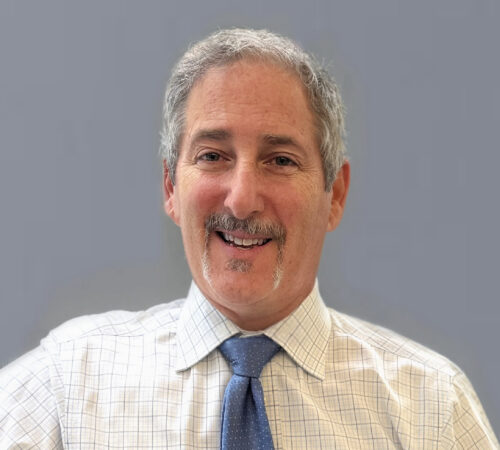 Headshot photo of Andrew Keil smiling