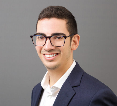 Headshot photo of Chris Landi smiling