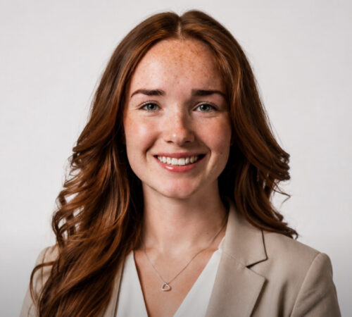 Headshot photo of Bridget McGahan smiling.