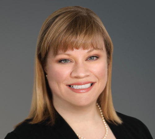 Headshot photo of Jane Talbot smiling