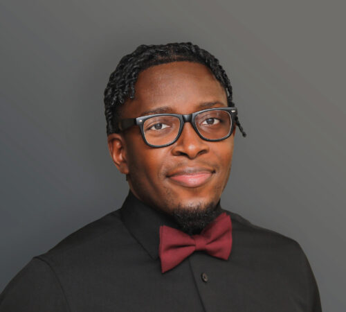 Headshot photo of Brendan Tumwesigye smiling