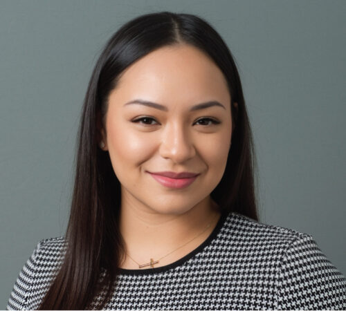 Headshot photo of Angela Urena smiling.