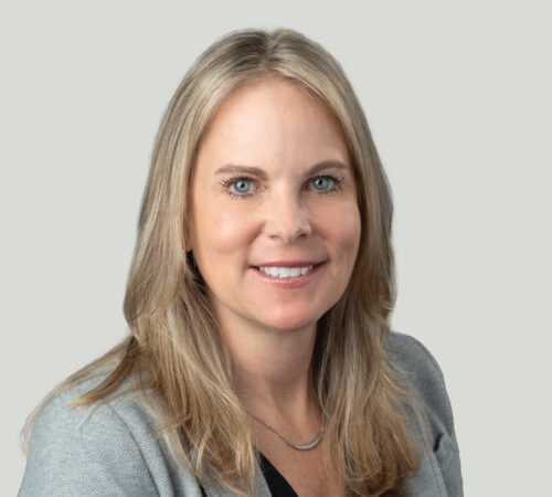 Headshot photo of Nicole Vespo smiling.